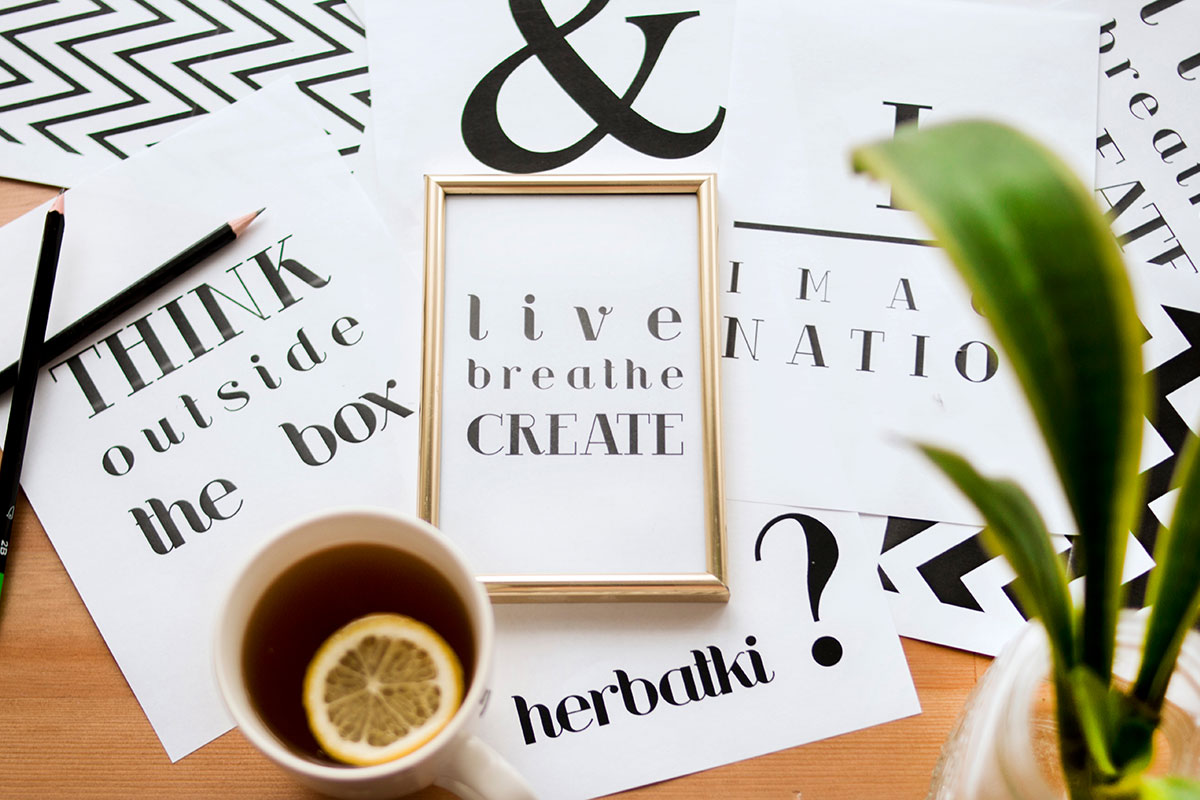 Canva - Quote Calligraphy Under Cup of Lemon Tea
